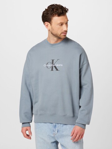 Calvin Klein Jeans Суичър в сиво: отпред