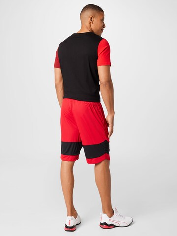 PUMA Loosefit Sportbroek in Rood