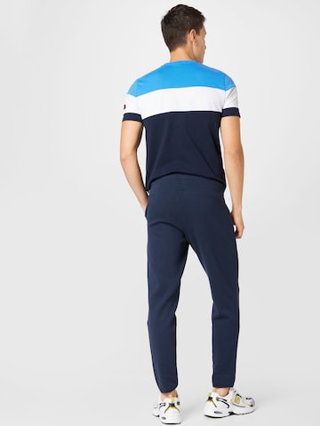 ELLESSE Tapered Sports trousers 'Diruta' in Blue