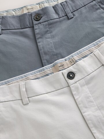 Slimfit Pantaloni chino di Next in beige