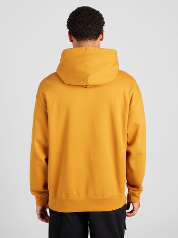 Nike Sportswear - Sweatshirt 'Swoosh' em amarelo