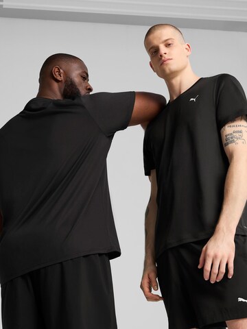 PUMA Performance shirt 'Tad Essentials' in Black: front