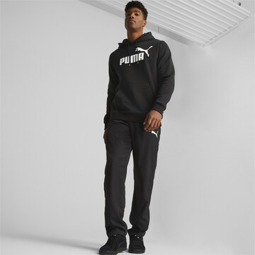 PUMA Sportsweatshirt 'Essentials' in Schwarz