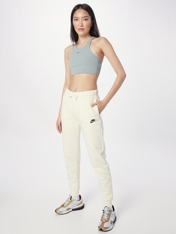 Nike Sportswear Alt kitsenev Püksid, värv beež