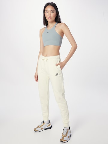 Effilé Pantalon Nike Sportswear en beige