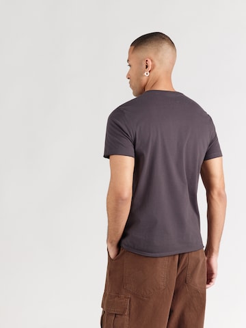 AMPLIFIED Koszulka 'KORN - FOLLOW THE LEADER' w kolorze szary