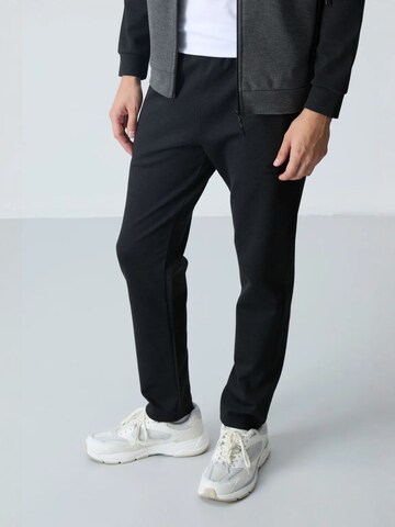 Survêtement 'Aktive Sets' Tommy Life en mélange de couleurs