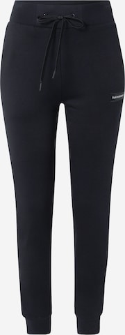 Effilé Pantalon outdoor PEAK PERFORMANCE en noir : devant