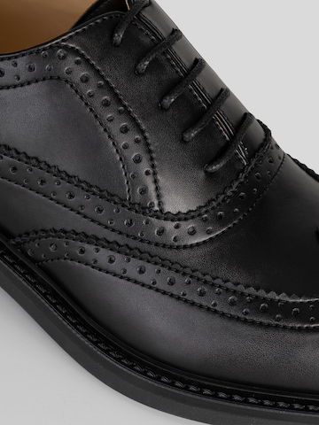 Scarpa stringata 'Brogue' di Solari Milano in nero