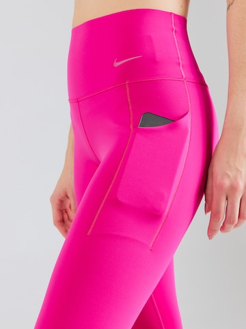 NIKE Skinny Spodnie sportowe 'UNIVERSA' w kolorze różowy