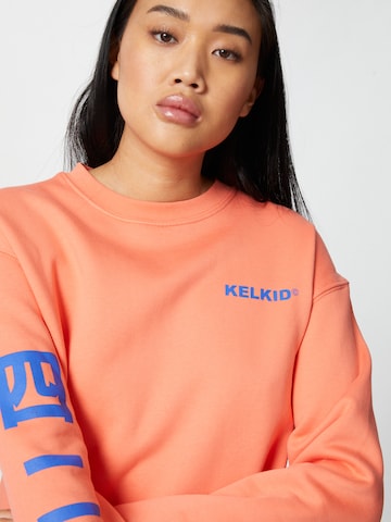 Sweat-shirt 'Kelkid' ABOUT YOU x Mero en orange