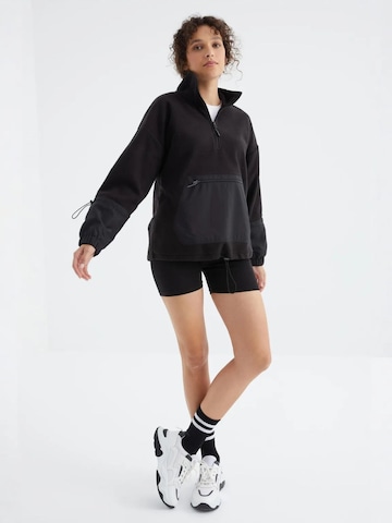 Sweat-shirt Tommy Life en noir