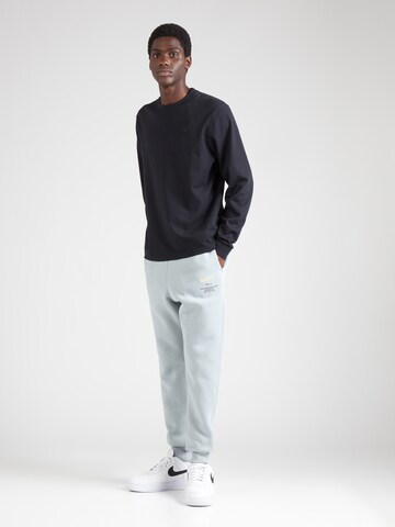 Nike Sportswear Tapered Hose in Blau