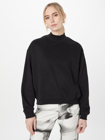 WEEKDAYSweater majica - crna boja: prednji dio