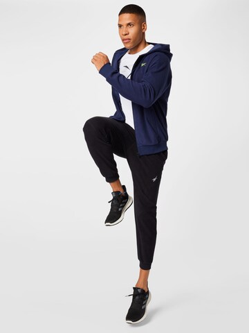 Reebok Tapered Sportbroek in Zwart