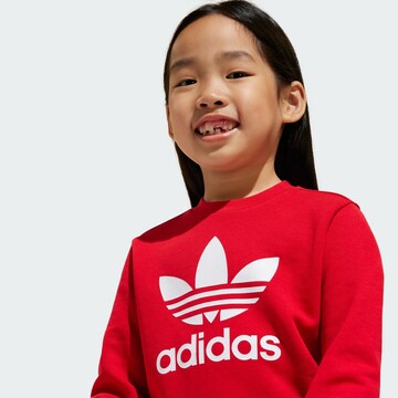ADIDAS ORIGINALS - Ropa para correr 'Adicolor' en rojo