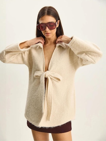 Cardigan Bianco Lucci en beige
