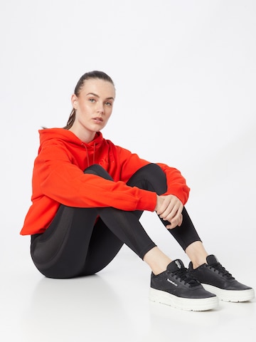 PUMA Sweatshirt 'x Vogue Collection' in Red