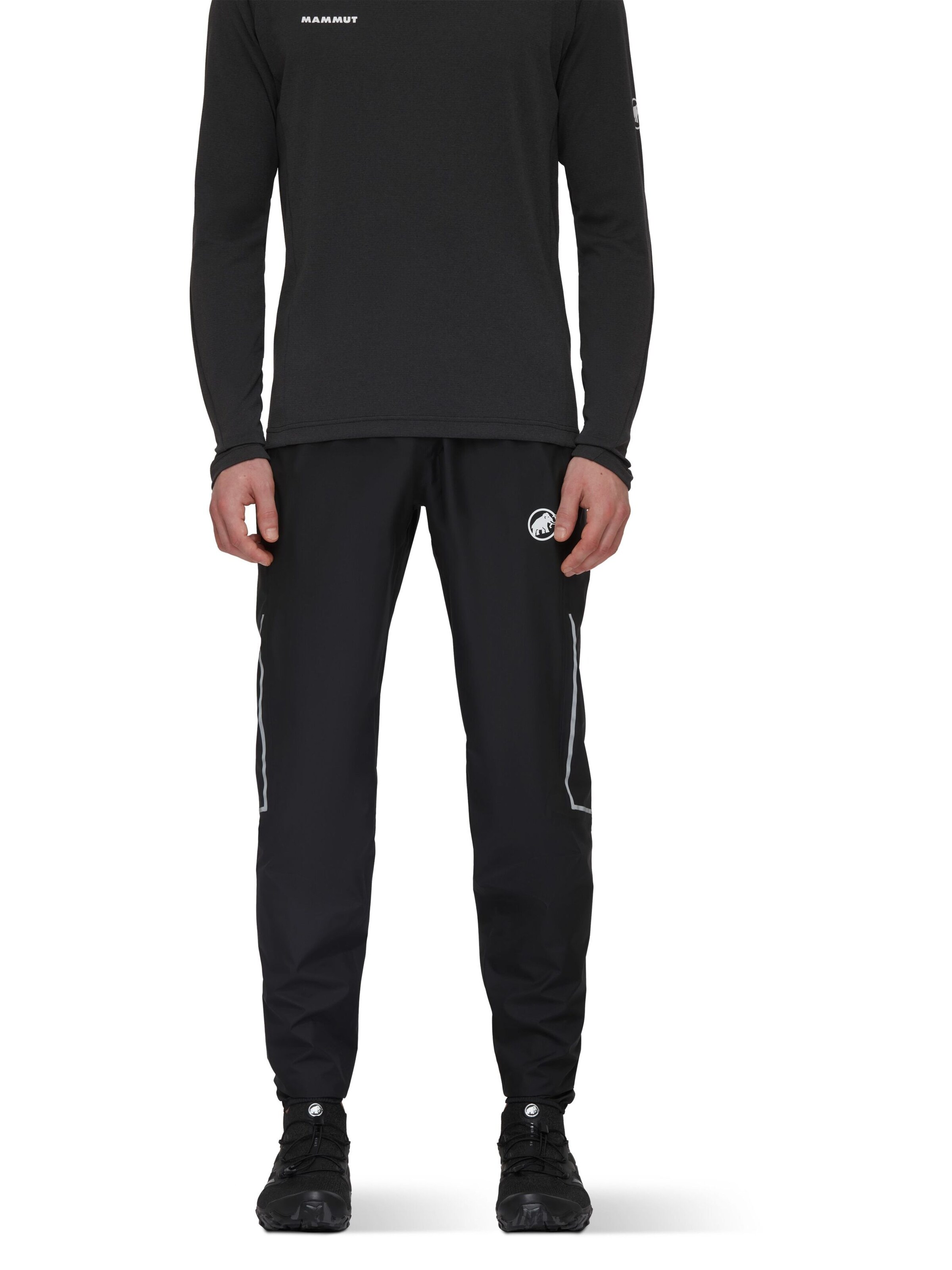 MAMMUT Tapered Outdoor Pants in Black: front