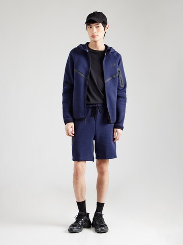 Nike Sportswear - Loosefit Pantalón 'TCH FLC' en azul