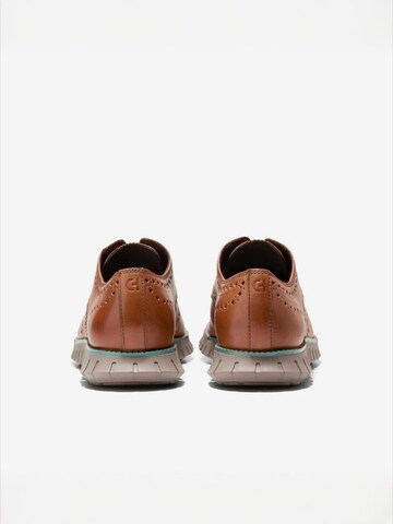 Cole Haan Nauhakengät 'ZG RMSTD WINGTIP OX' värissä ruskea