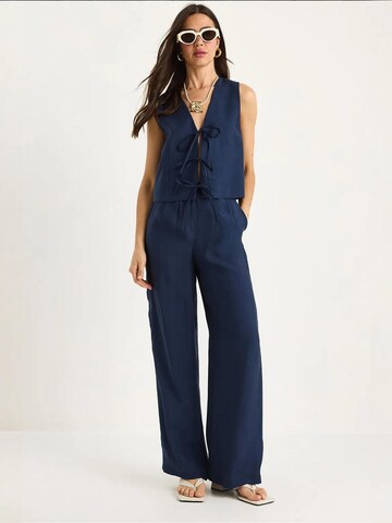 Bianco Lucci - Calças de fato em azul: frente