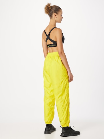 ADIDAS BY STELLA MCCARTNEY Tapered Workout Pants 'Lined Winter' in Yellow