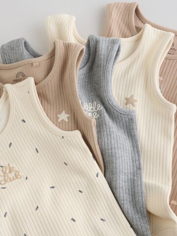 Next Sparkdräkt/body i beige
