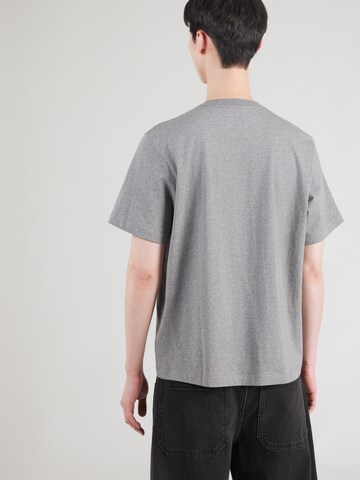 Calvin Klein Jeans Tričko '20S COLLEGE' - Sivá