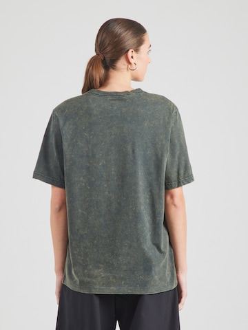 Tricou 'LUXE' de la Nike Sportswear pe negru