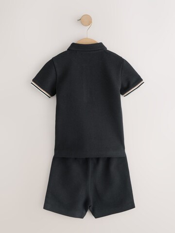 Next - Conjunto en negro