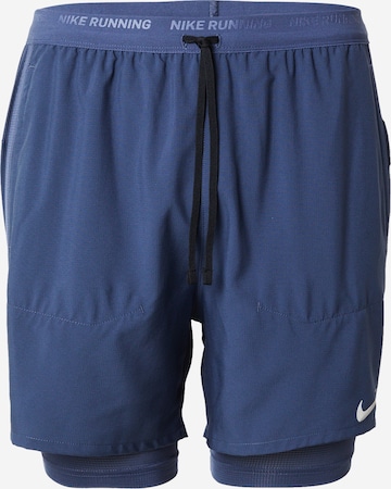 Regular Pantalon de sport 'STRIDE' NIKE en bleu : devant