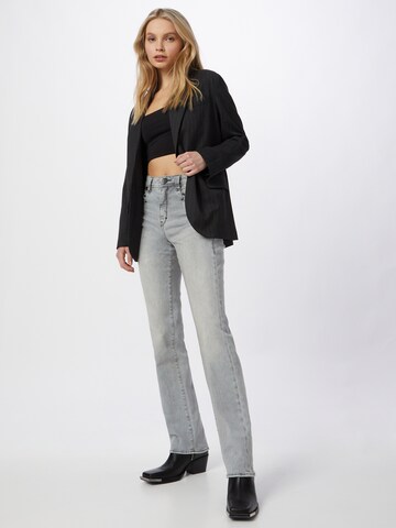 Regular Jean Herrlicher en gris