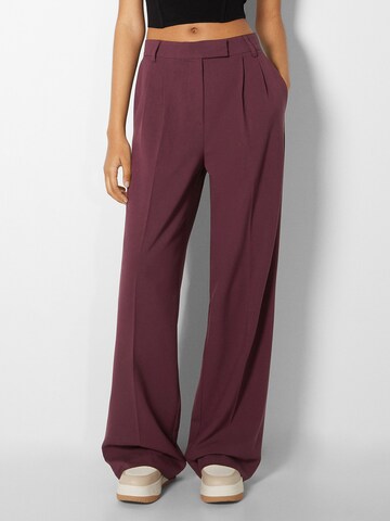 Bershka Wide leg Pleated Pants in Red: front
