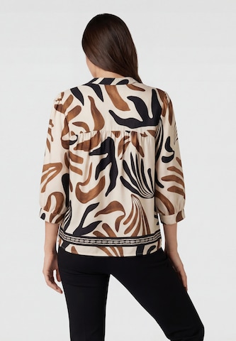 Usha - Blusa en azul