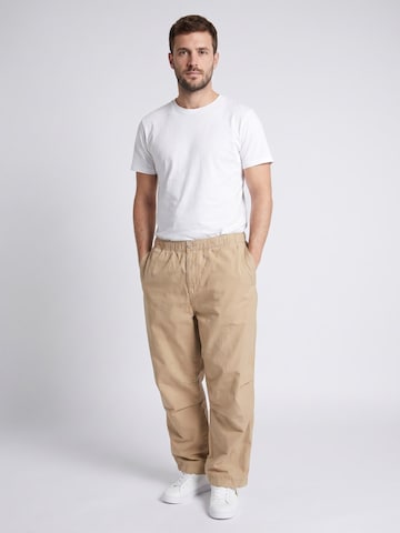 Baggy Pantaloni 'Judd Pant Wall /garment dyed' di Carhartt WIP in beige