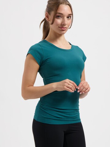 Urban Goddess Yoga & Activewear Sporttop 'Zefira Yoga & Pilates' in Grün