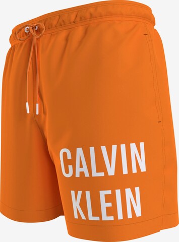 Calvin Klein Swimwear Plavecké šortky – oranžová