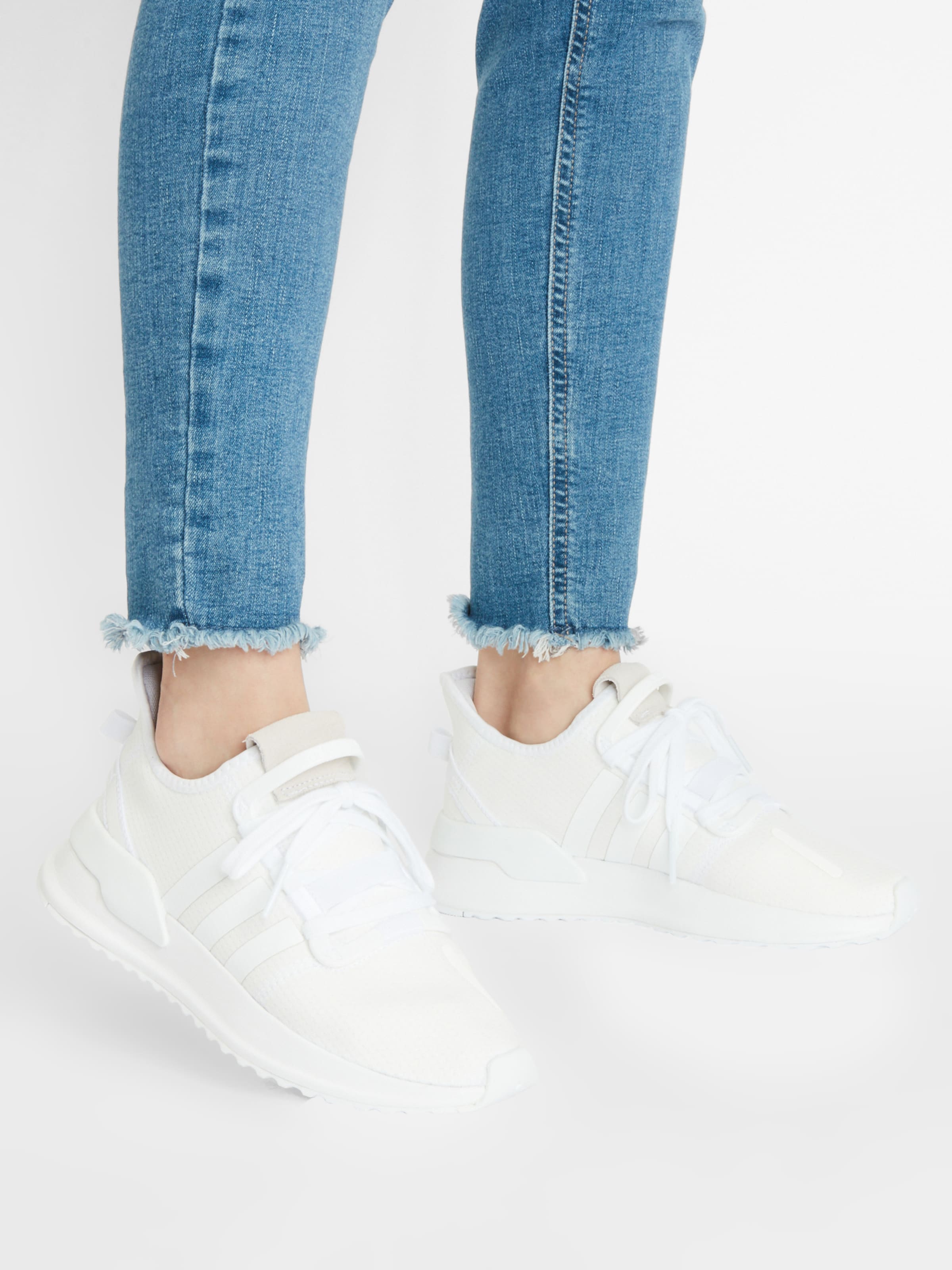 all white adidas u path