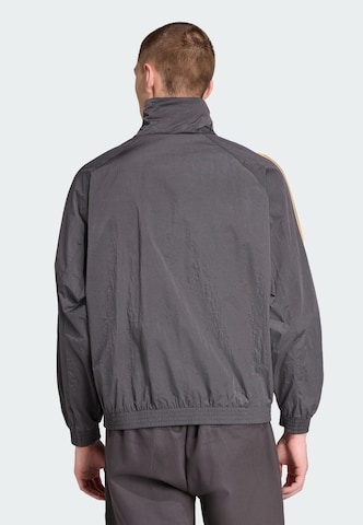 Veste mi-saison 'Manchester United Terrace Icons' ADIDAS ORIGINALS en noir