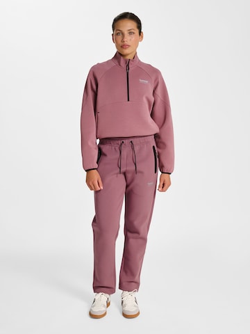 Hummel Regular Sports trousers in Pink
