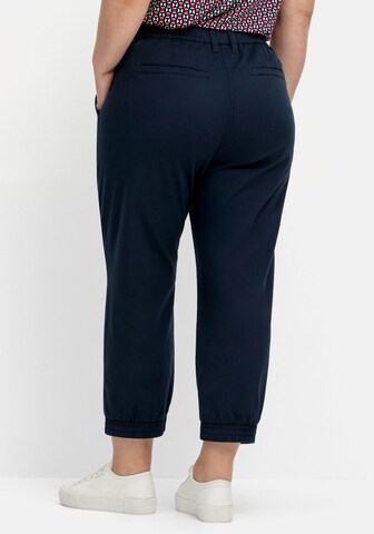 SHEEGO - Tapered Pantalón cargo en azul