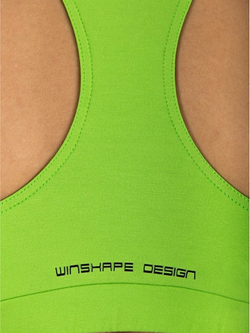 Winshape Bygelfri Sportbehå 'WVR1' i grön