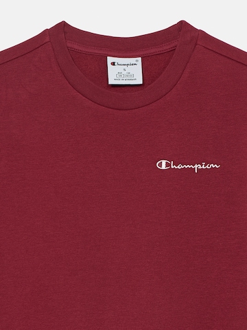 Champion Authentic Athletic Apparel Sweatshirt i röd