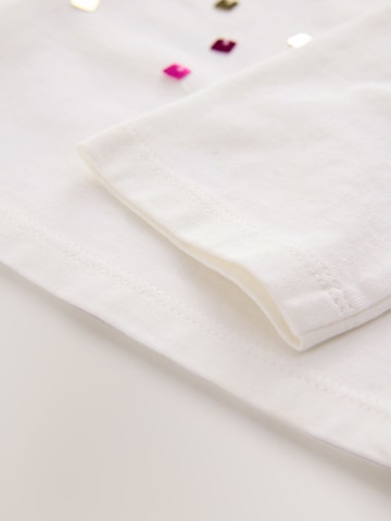 T-Shirt Next en blanc