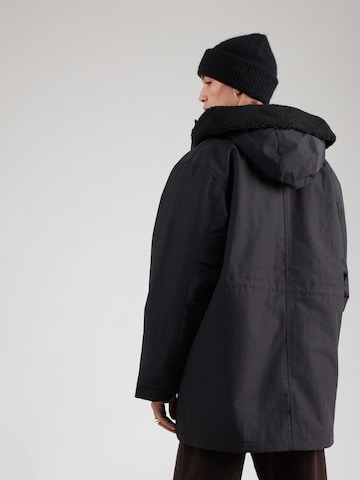 Carhartt WIP Téli parka 'Siberia' - fekete