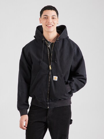 Veste de survêtement Carhartt WIP en noir : devant
