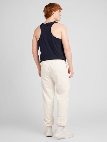 Champion Authentic Athletic Apparel Tapered Hose in Weiß