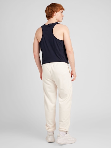 Effilé Pantalon Champion Authentic Athletic Apparel en blanc