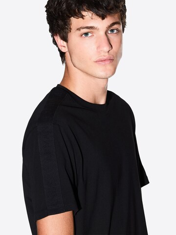 Maglietta di ARMANI EXCHANGE in nero